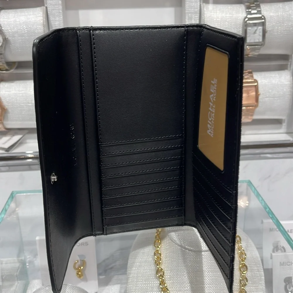 Michael Kors Jet Set Large Logo Trifold Wallet
Optic White Multi
NWT - Picture 9 of 16
